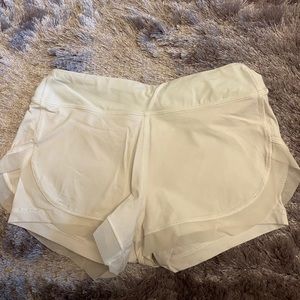 Never worn ivivva white shorts